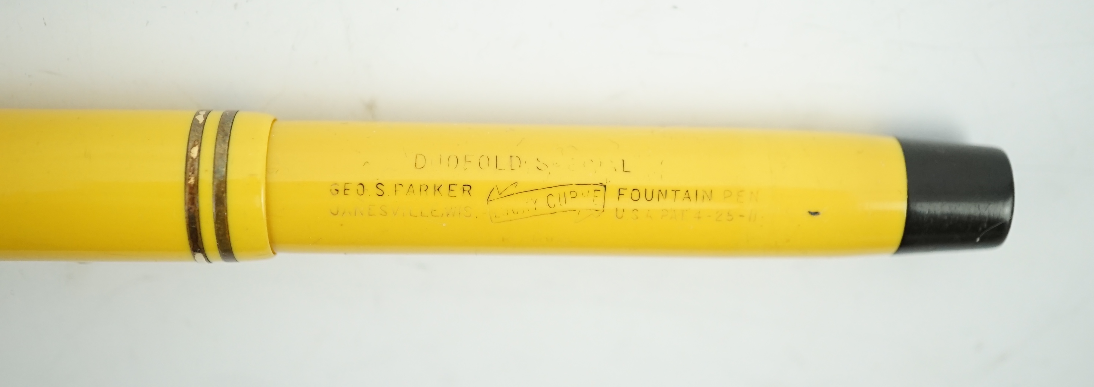 A Parker Duofold Junior Special fountain pen in mandarin yellow